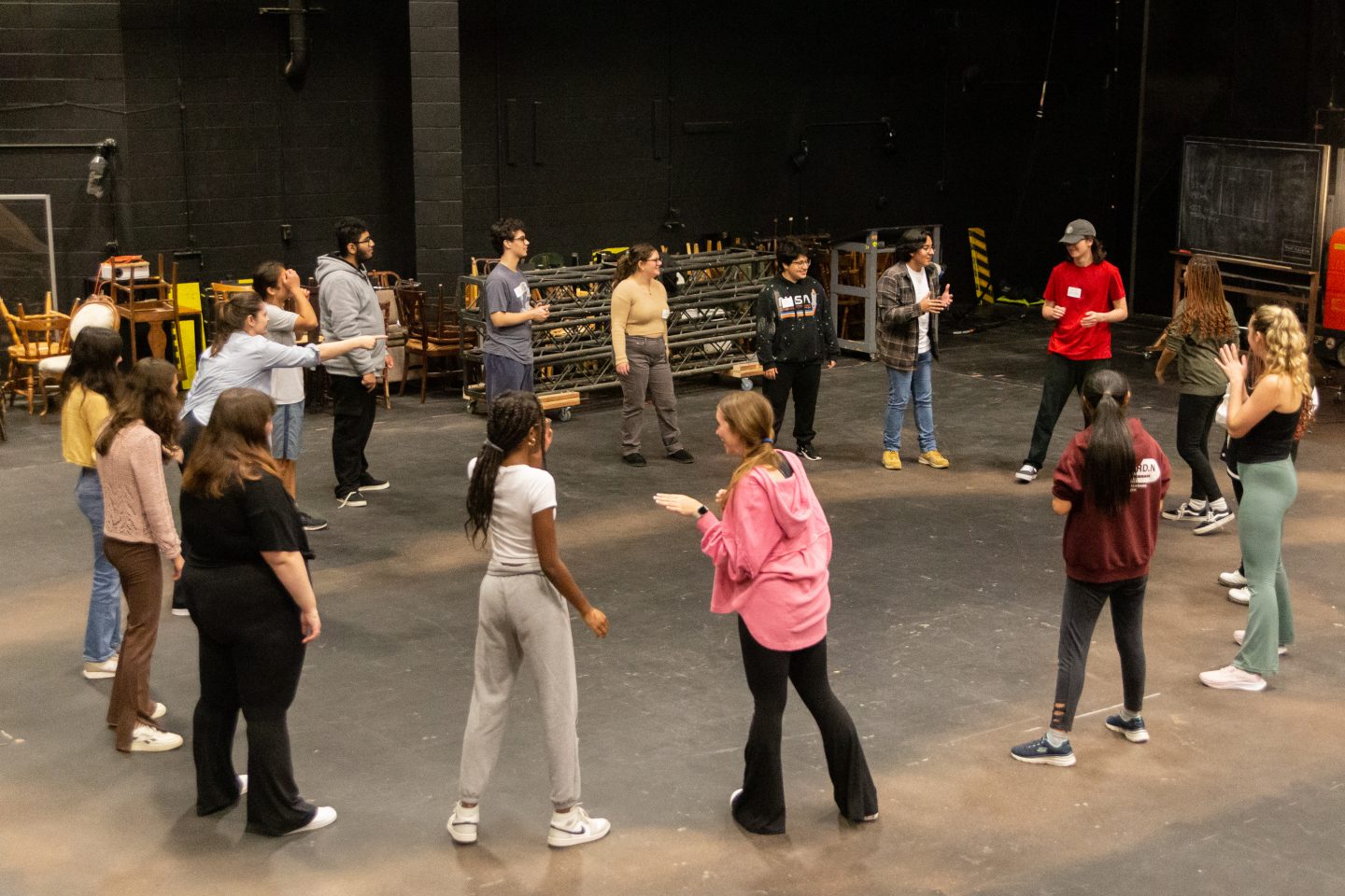 Seventeen male and female high school students take part in an animated “Day With the Arts” session at Adelphi.