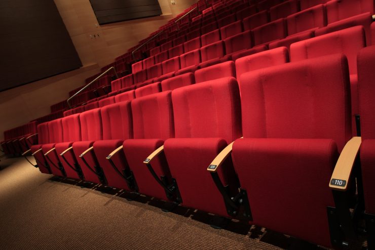 row of red theatre chairs