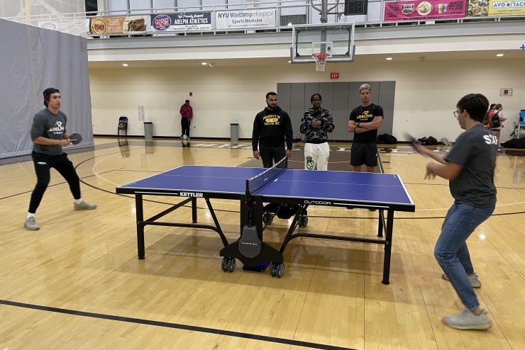 A table tennis game at Adelphi University