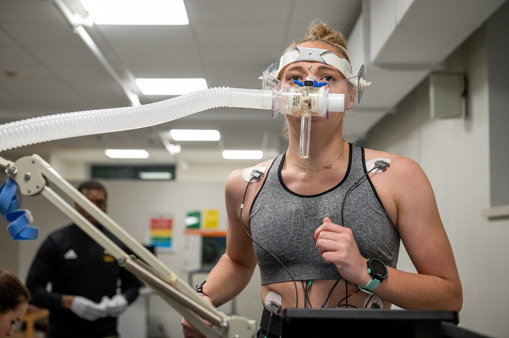 An Adelphi student-athlete participating in a Maximal Oxygen Consumption Test (Max VO2) with Efficiency.