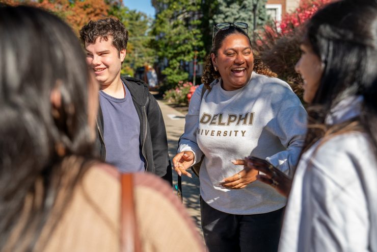 Students at Adelphi laughing on campus