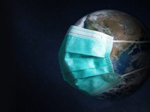 A collage of the globe wearing a surgical mask.