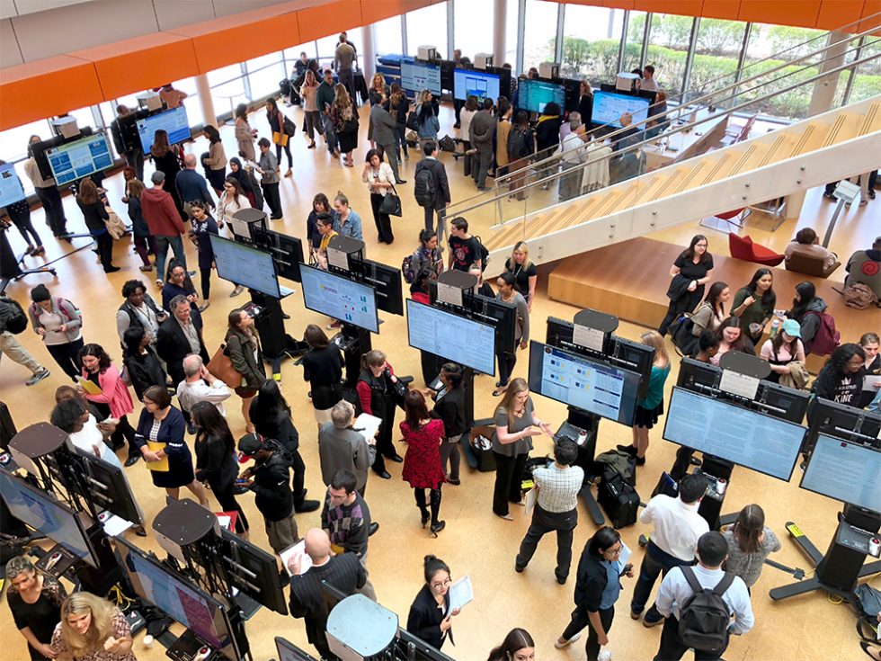 2018 Research Day at Adelphi - crowd of people in the Nexus Building looking at research posters