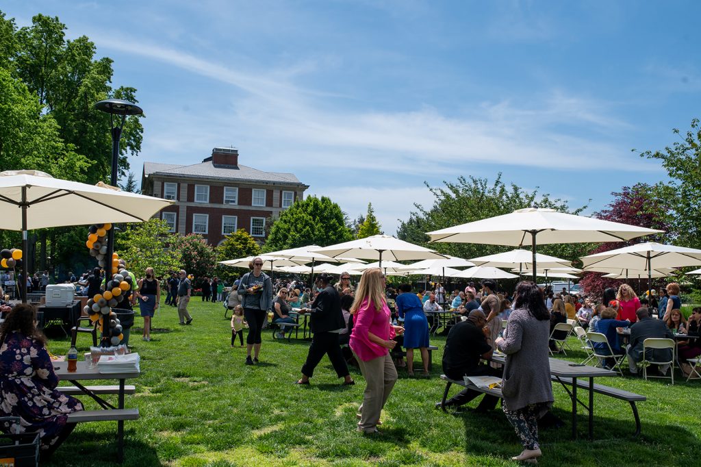 Adelphi Employee BBQ - View of people on the lawn near Blodgett Hall