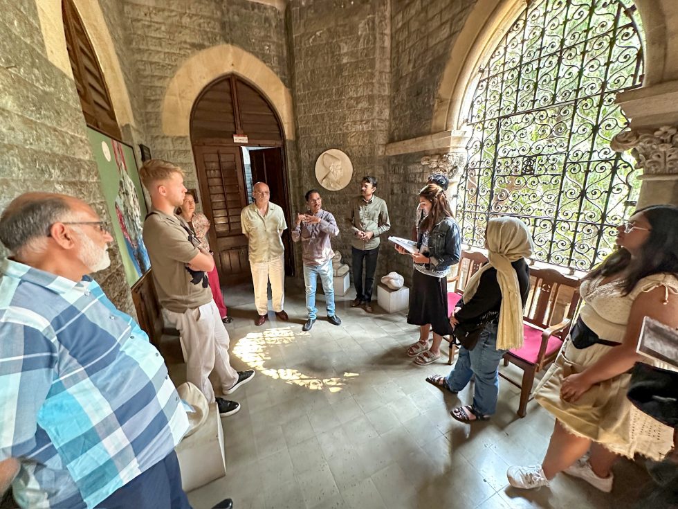 Bhisé Global Understanding Project participants visiting the Sir JJ School of Art in Mumbai, India, interacting with students and faculty.