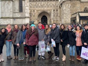 A group of students in front of Westminster Abbey.