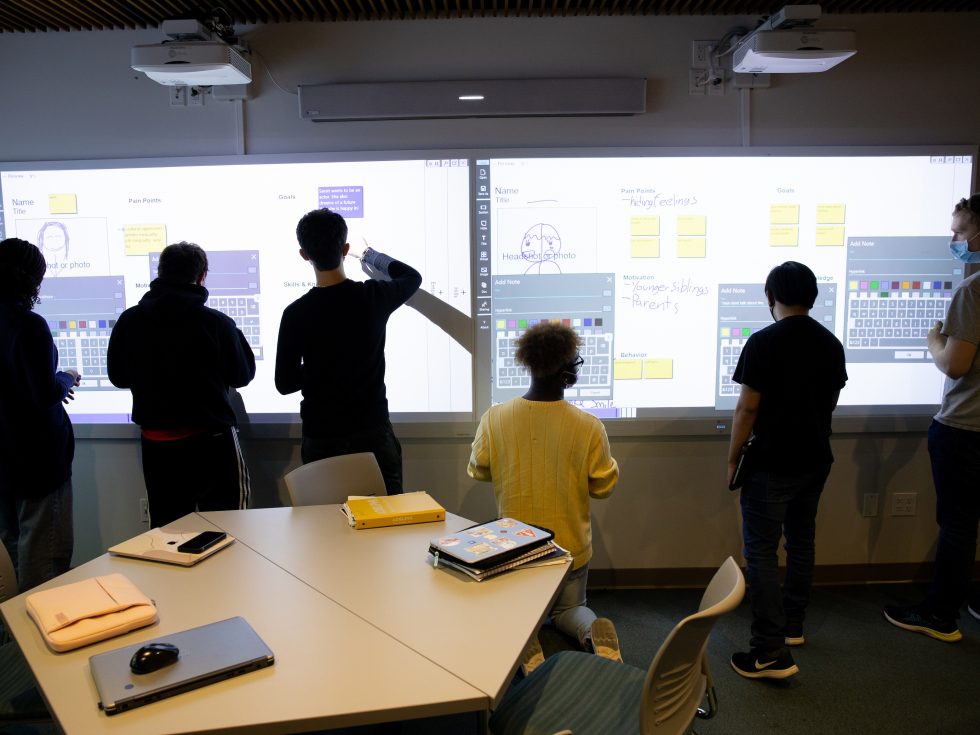 Students standing in Adelphi&#039;s Innovation Center